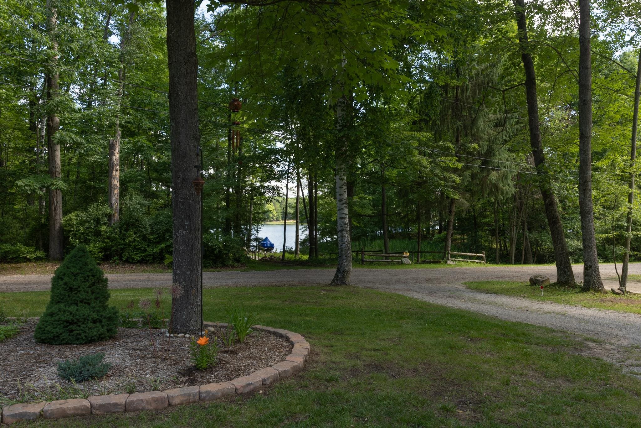 7692 Lakeview Street Harrison, MI 48625 - Photo 2 of 21 1947358-29c2eafe-6799-49cf-a9f2-c15bf98b05b2.JPG