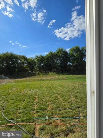 a view of a lake from a yard