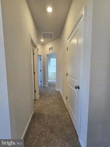 a utility room with washer and dryer