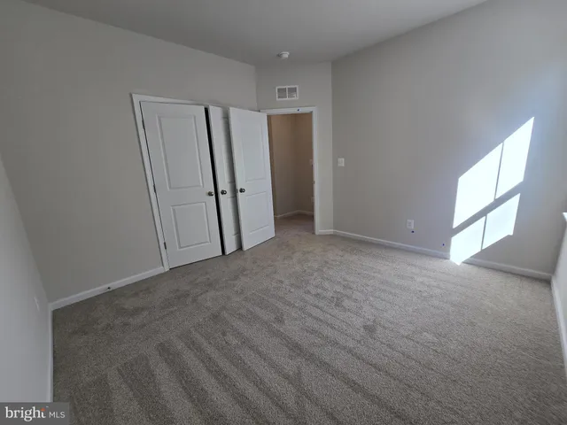 a view of small space with racks on the wall