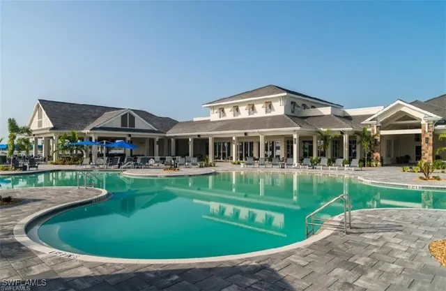 a outdoor living space with patio furniture and potted plants