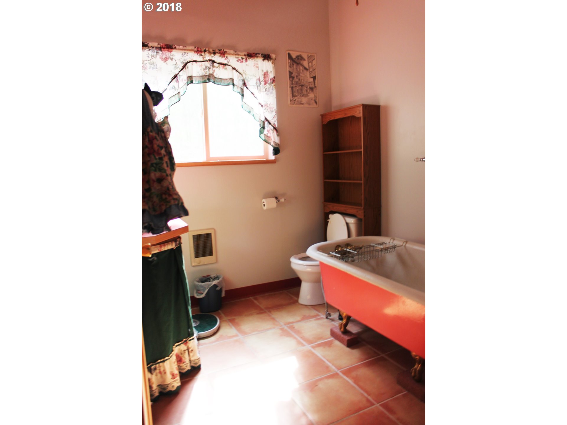 1075 Maple Sumpter, OR 97877 - Photo 4 of 8 a room with a cabinet and gym equipment