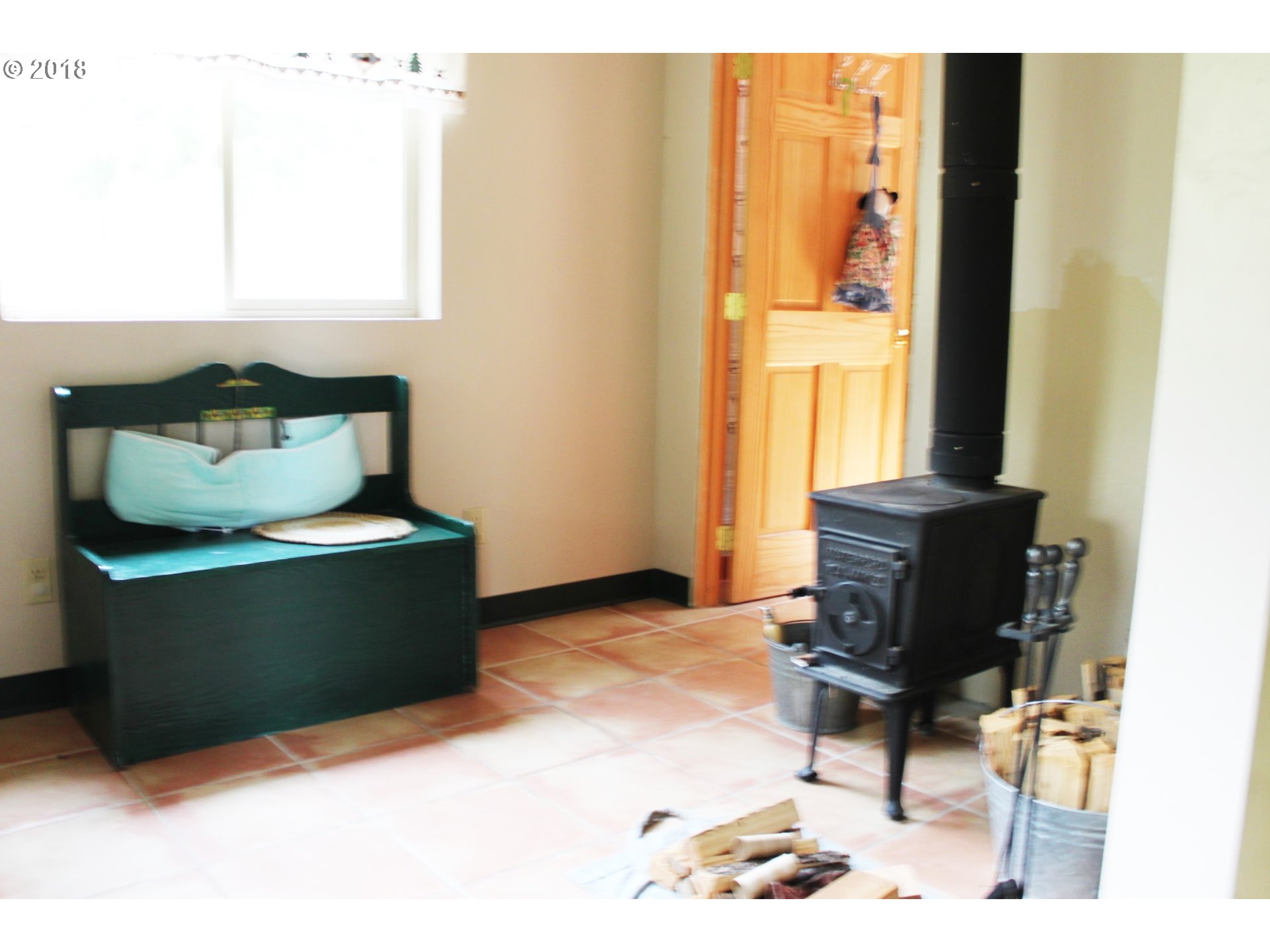 1075 Maple Sumpter, OR 97877 - Photo 5 of 8 a living room with furniture and a window