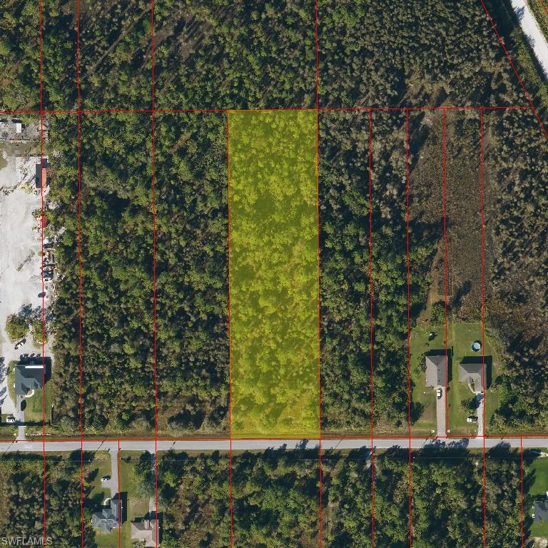 4481 68th Avenue Northeast Naples, FL 34120 - Photo 1 of 3 a view of a yard