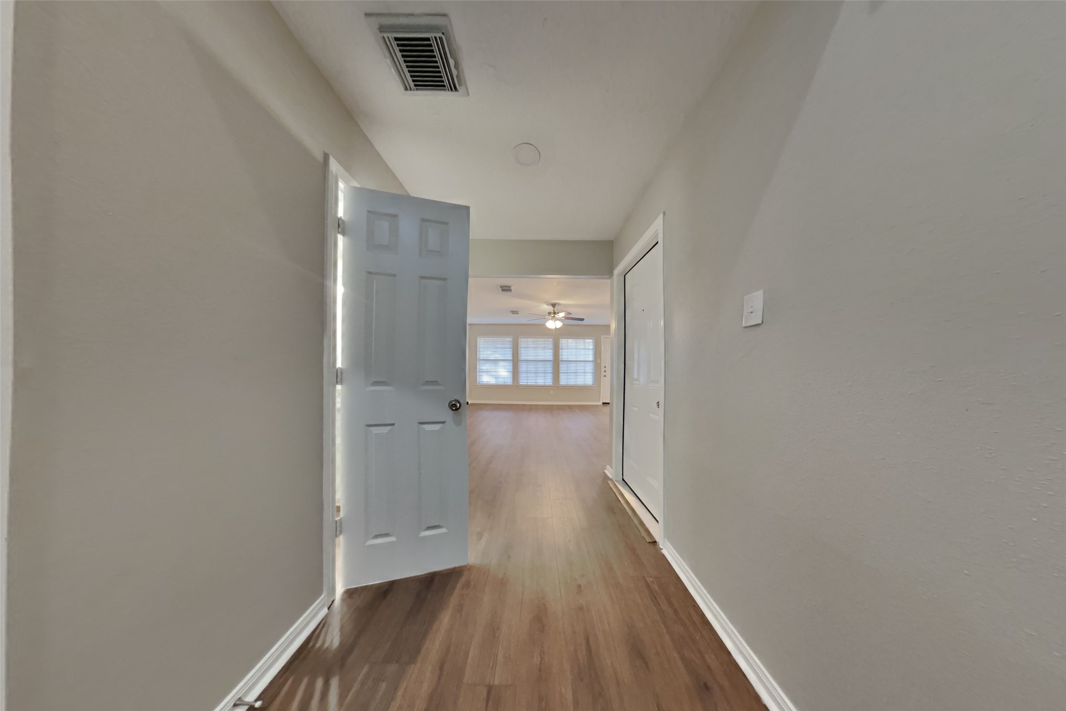 3423 Berry Grove Drive Spring, TX 77388 - Photo 3 of 21 a view of a hallway with wooden floor