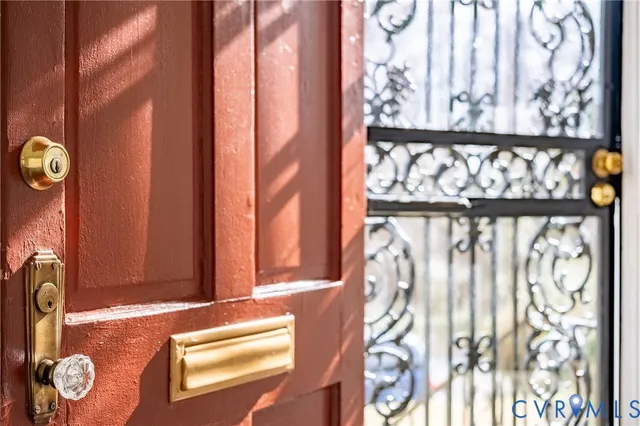 a view of a door and a window