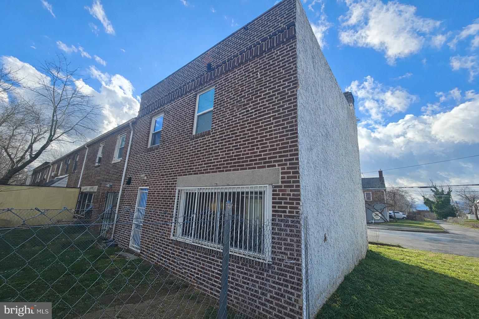 1315 Honan Street Chester, PA 19013 - Photo 15 of 15 a view of a house with a yard