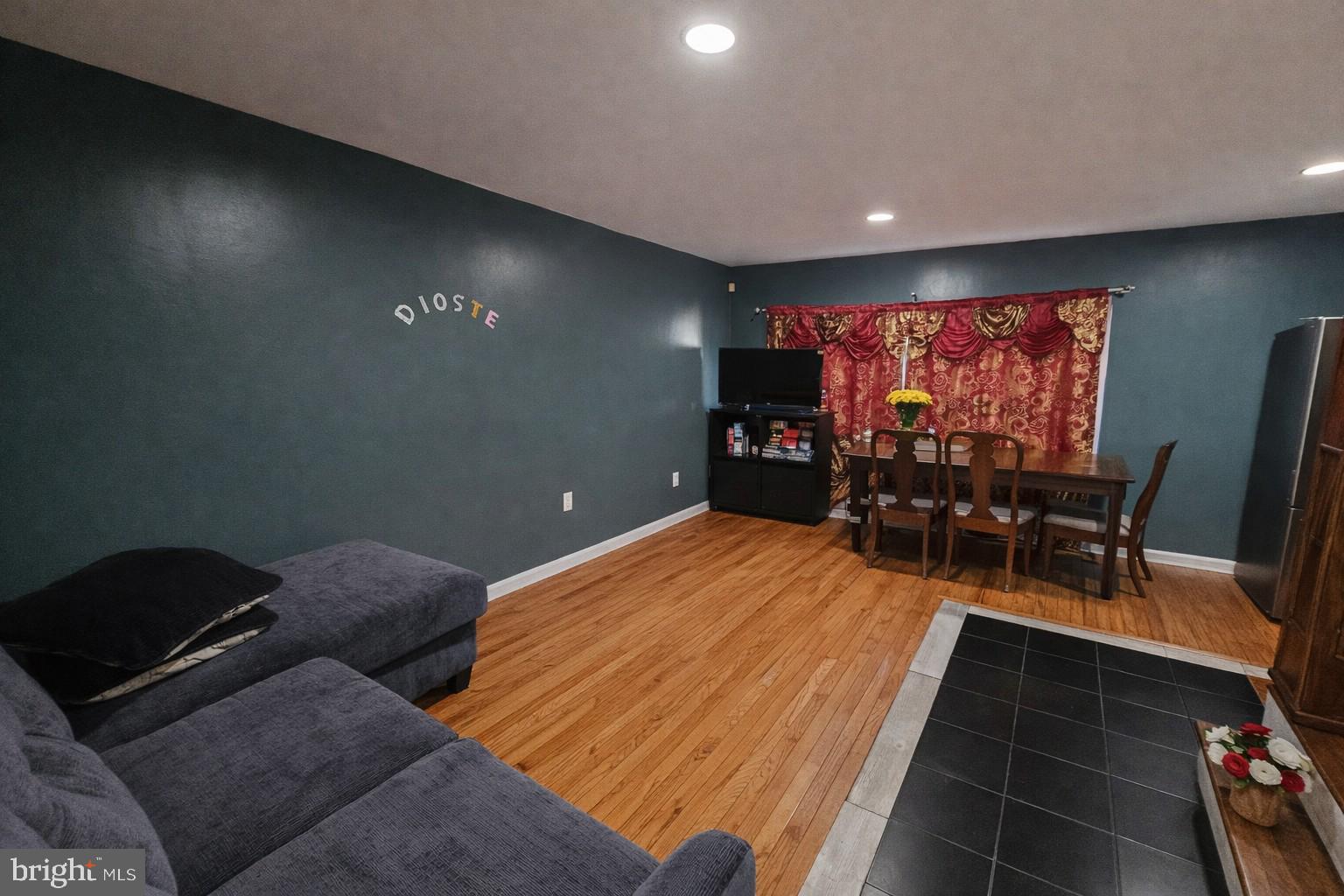 1315 Honan Street Chester, PA 19013 - Photo 2 of 15 a living room with furniture and a flat screen tv