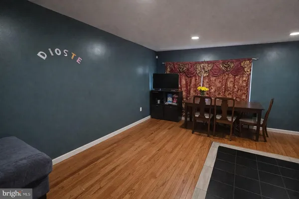 a view of a livingroom with furniture and window
