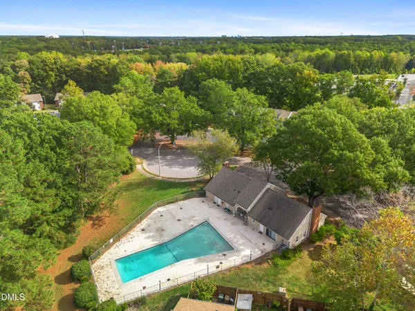 an aerial view of a highlighted house