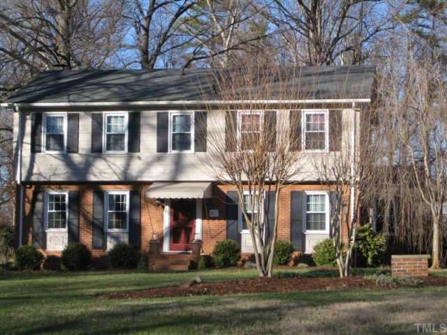 518 Andover Road Durham, NC 27712 - Photo 1 of 9 front view of brick house with a yard