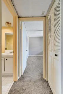 an empty room with a empty space and a window