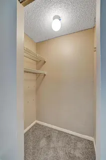 a view of a parked cars in front of a building