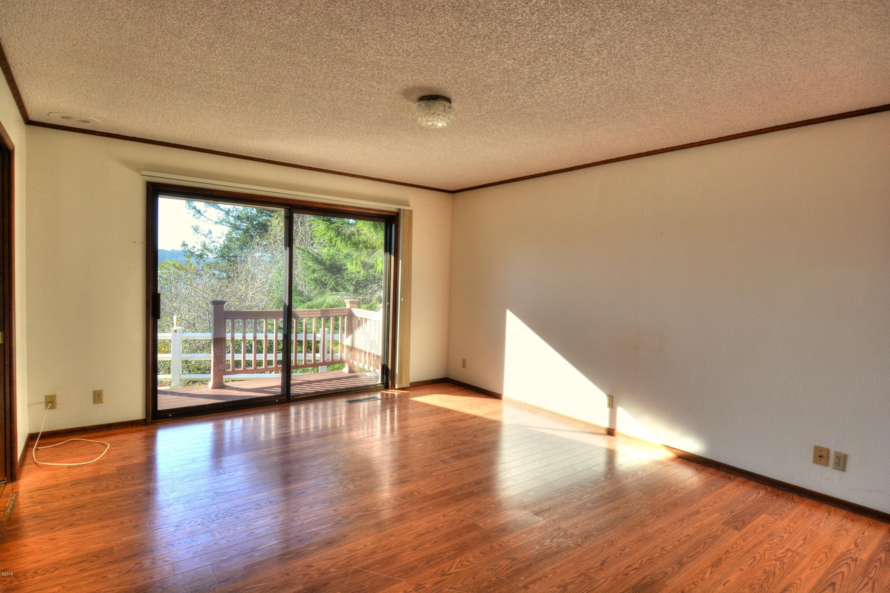 3220 North Bayview Road Waldport, OR 97394 - Photo 11 of 50 Master Bedroom.,