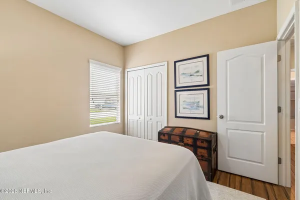 a bathroom with a sink double vanity and a mirror