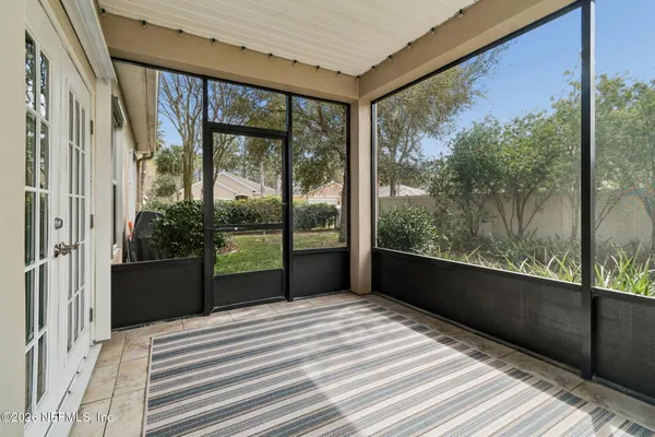 a view of a front of a house with a yard