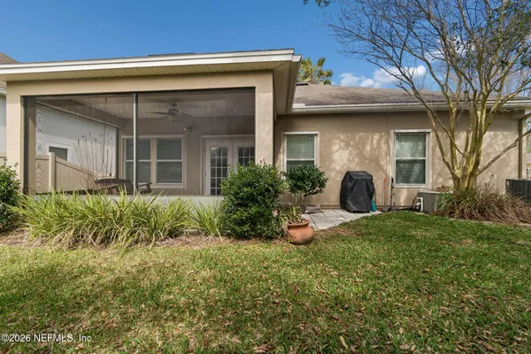 a view of a house with a street