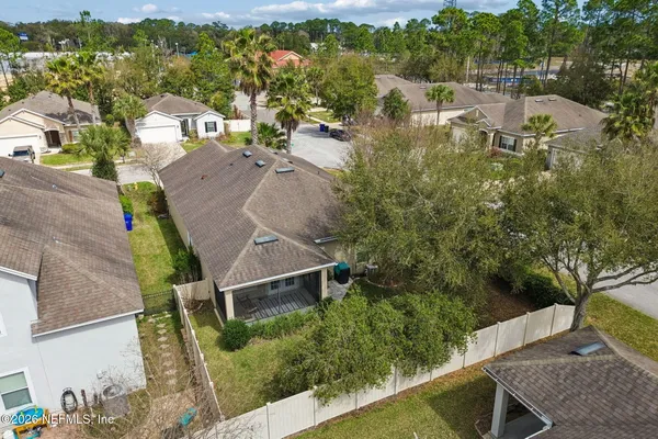 a view of a lake with a yard