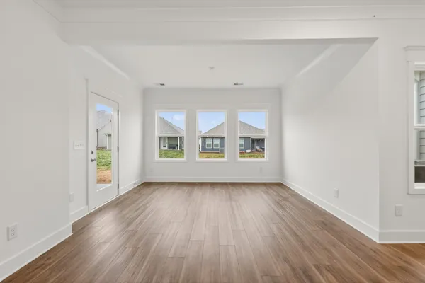 a bathroom with a sink toilet vanity and shower