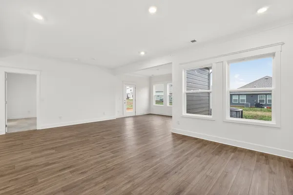 an empty room with windows