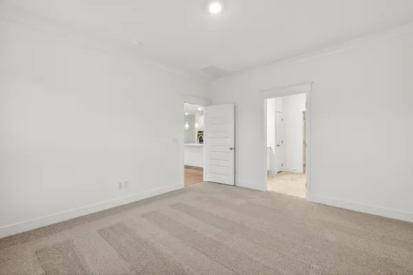 a spacious bathroom with a double vanity sink mirror and double