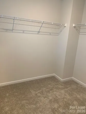 a view of a room with racks on the wall