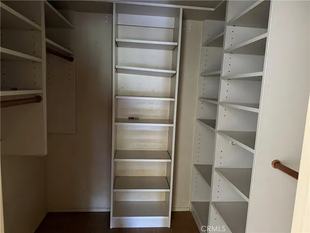 a bathroom with a shower and a toilet