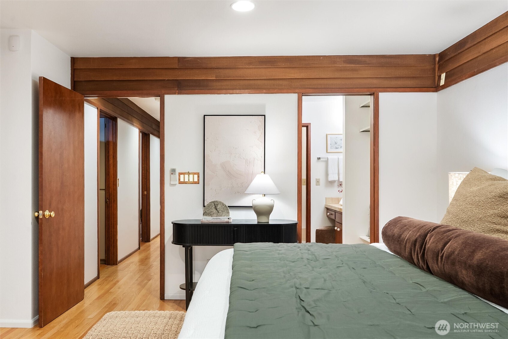 6920 160th Street Southwest Edmonds, WA 98026 - Photo 20 of 40 a bedroom with a bed and wooden floor