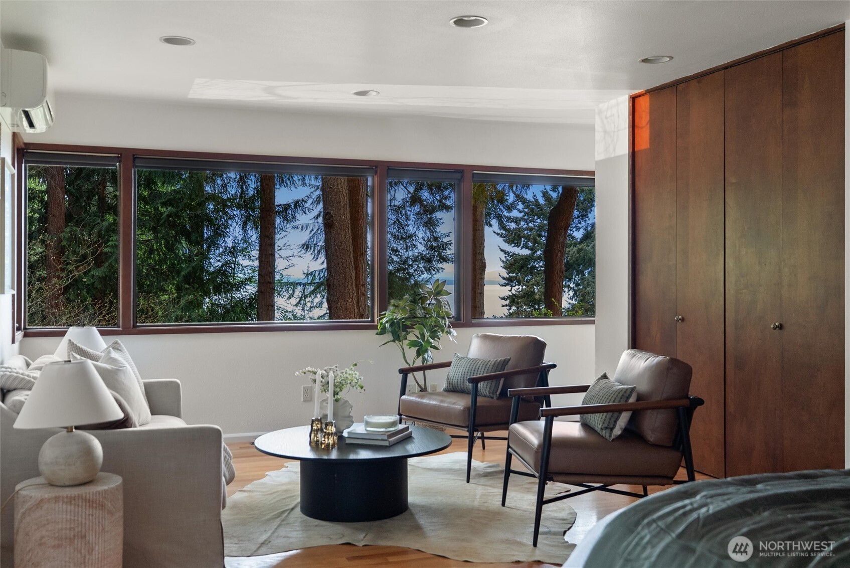 6920 160th Street Southwest Edmonds, WA 98026 - Photo 22 of 40 a living room with furniture and a potted plant