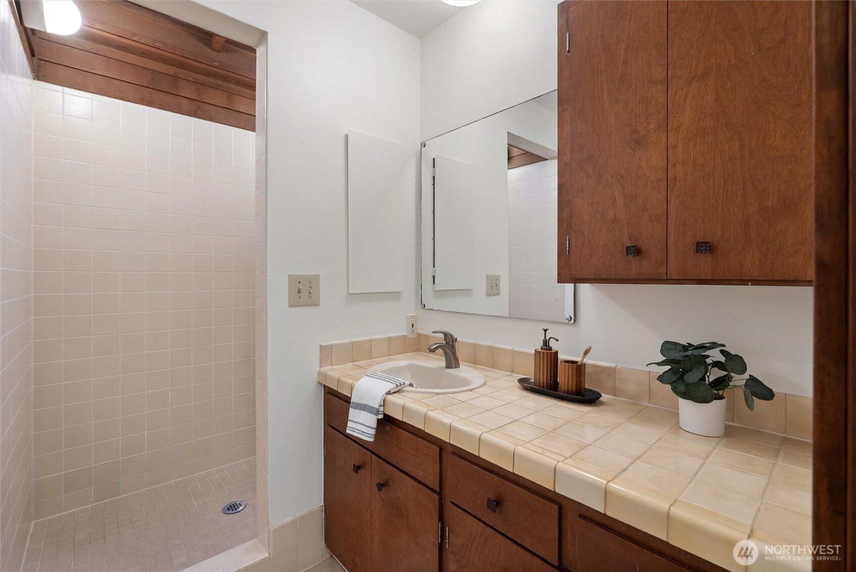 6920 160th Street Southwest Edmonds, WA 98026 - Photo 24 of 40 a kitchen with a sink and cabinets