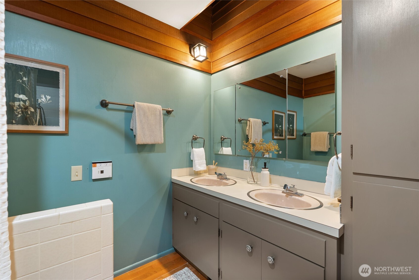 6920 160th Street Southwest Edmonds, WA 98026 - Photo 26 of 40 a bathroom with a sink and a mirror
