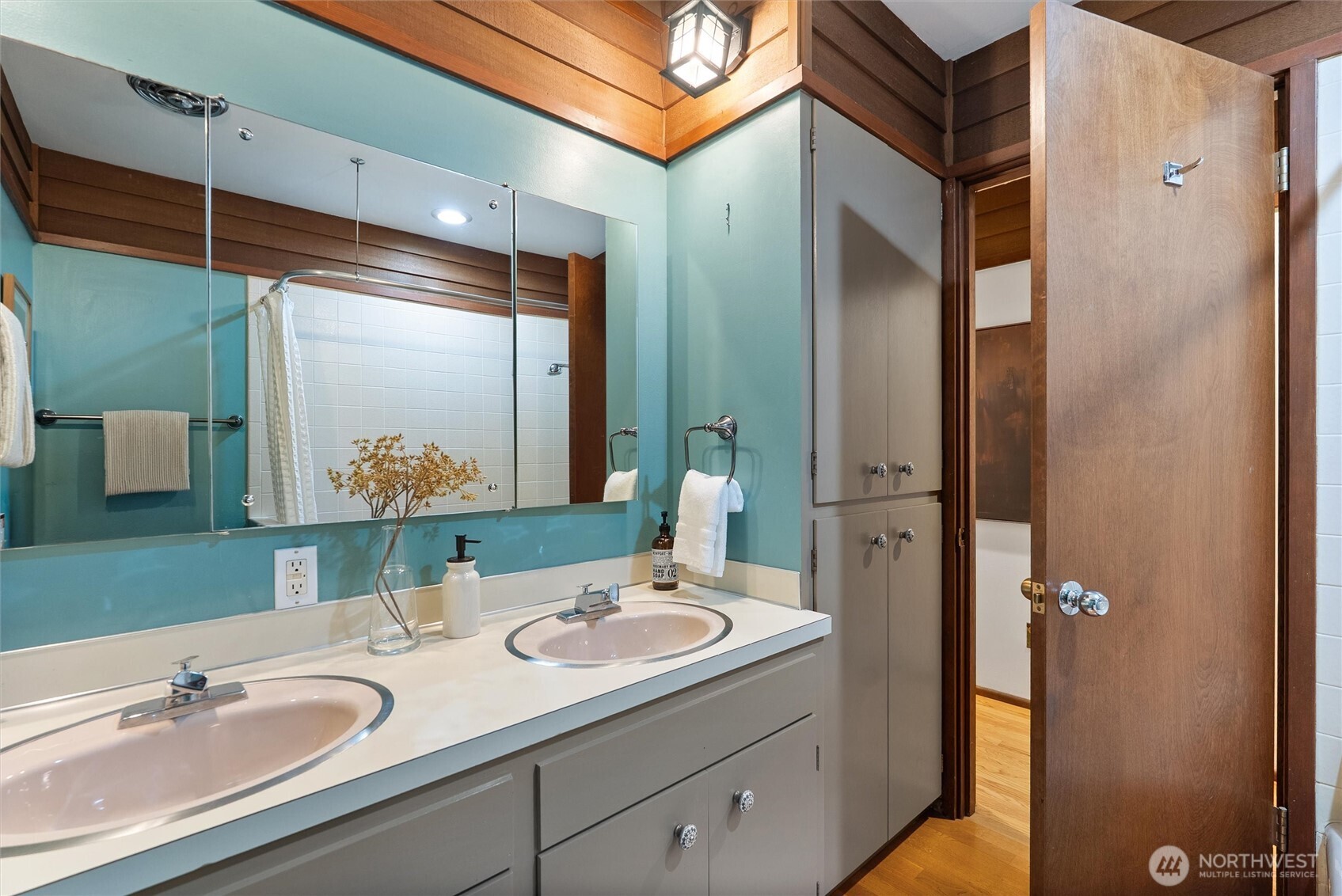 6920 160th Street Southwest Edmonds, WA 98026 - Photo 27 of 40 a bathroom with a sink and a mirror