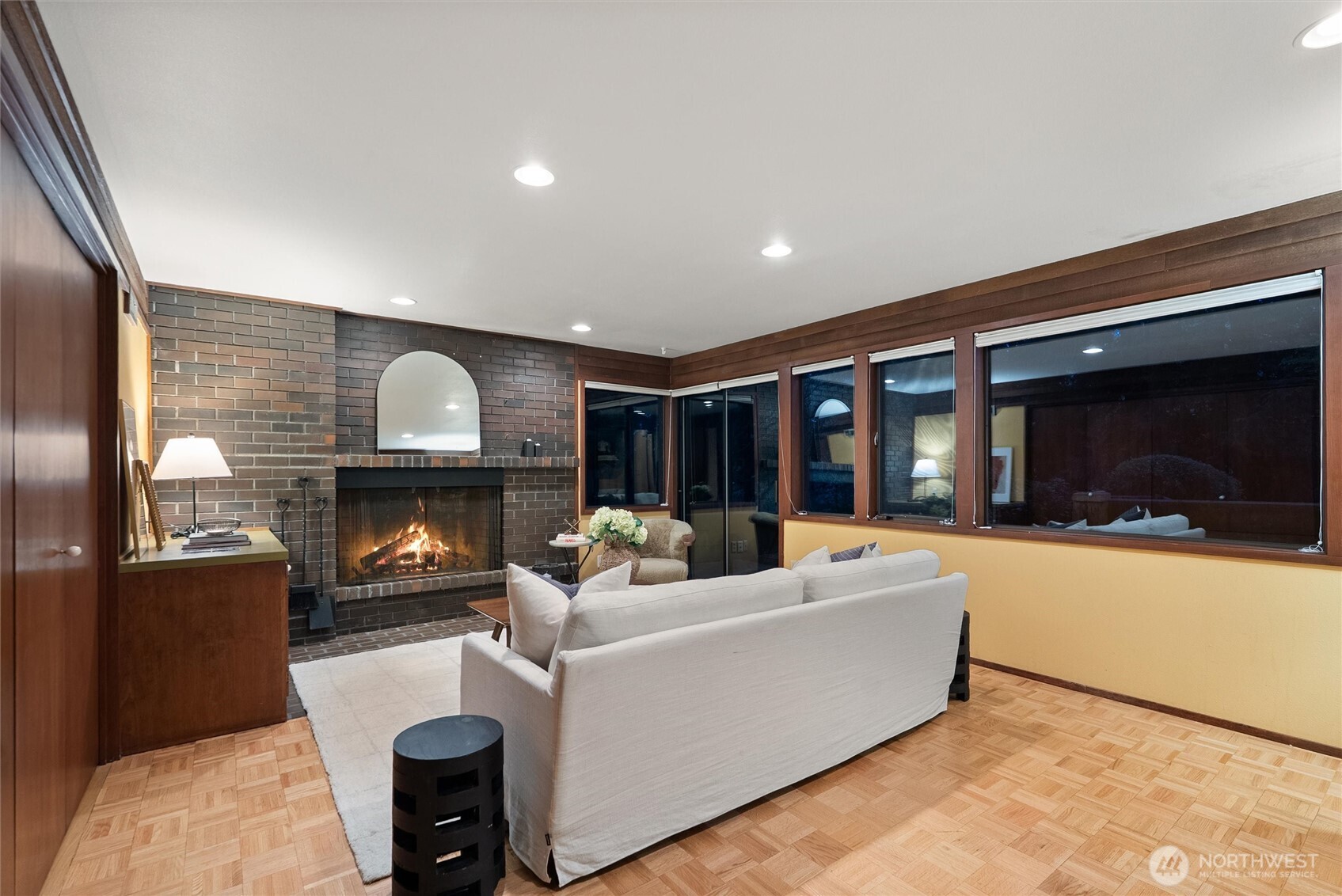 6920 160th Street Southwest Edmonds, WA 98026 - Photo 28 of 40 a living room with furniture and a fireplace