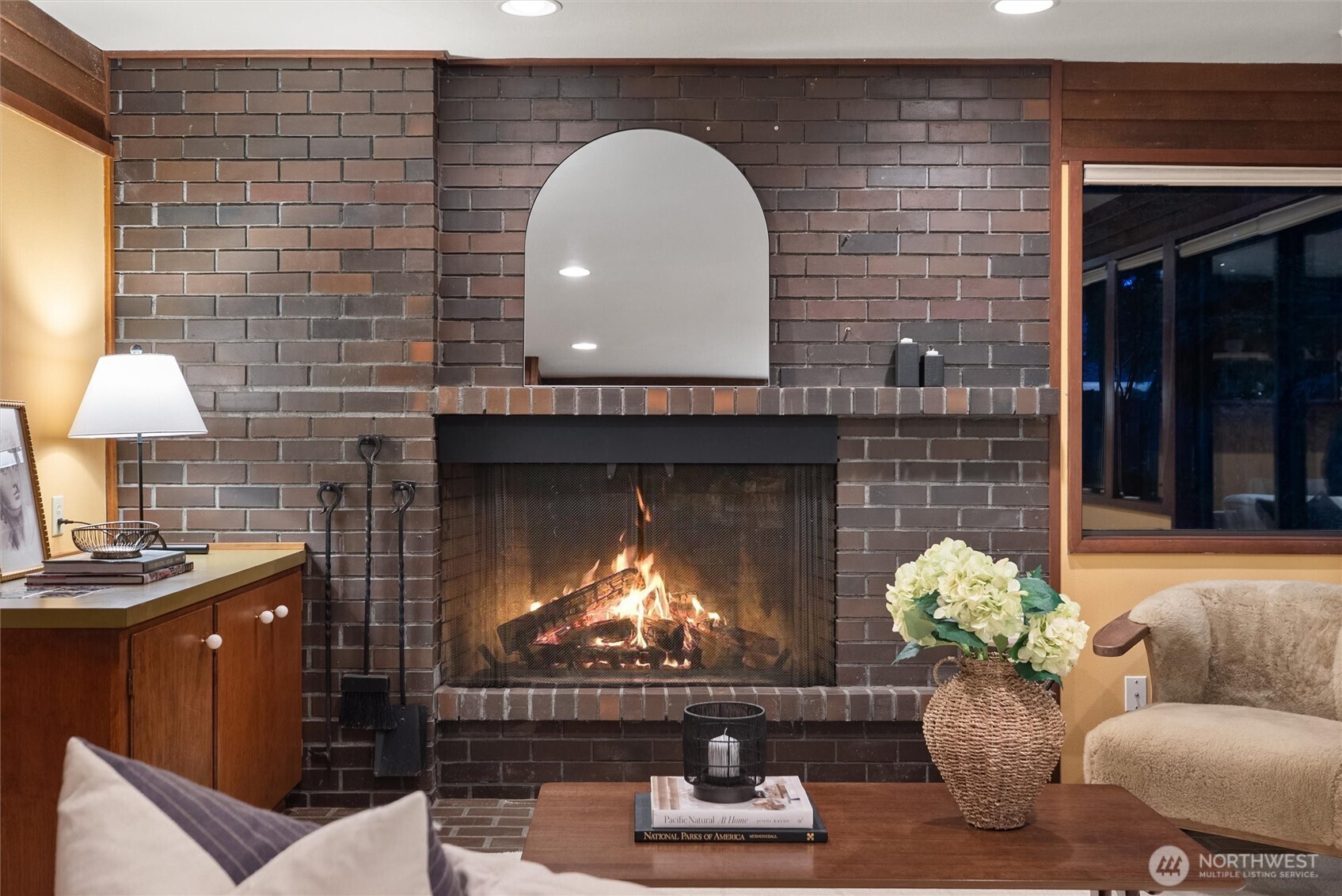 6920 160th Street Southwest Edmonds, WA 98026 - Photo 30 of 40 a living room with furniture and a fireplace