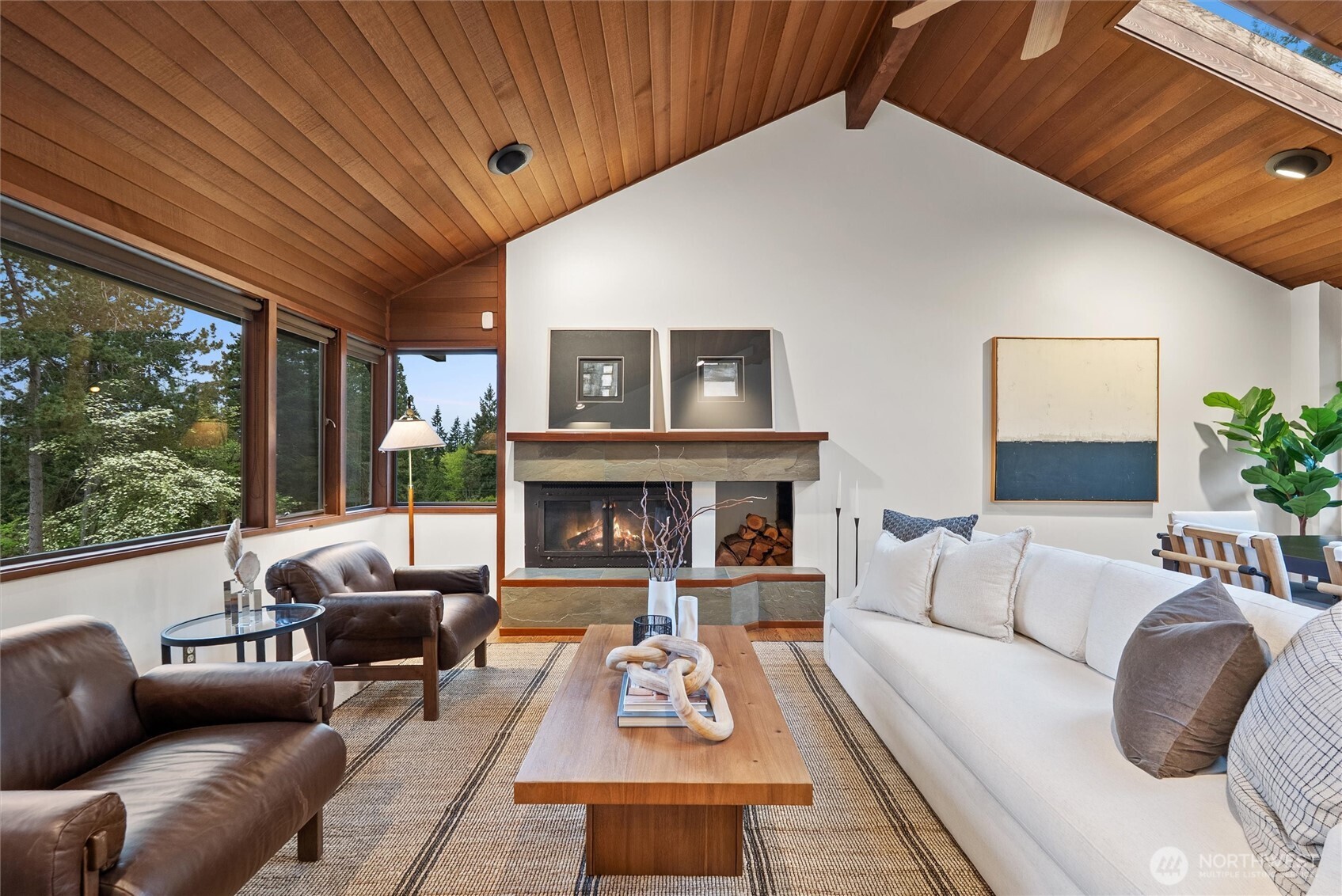 6920 160th Street Southwest Edmonds, WA 98026 - Photo 3 of 40 a living room with furniture and a fireplace