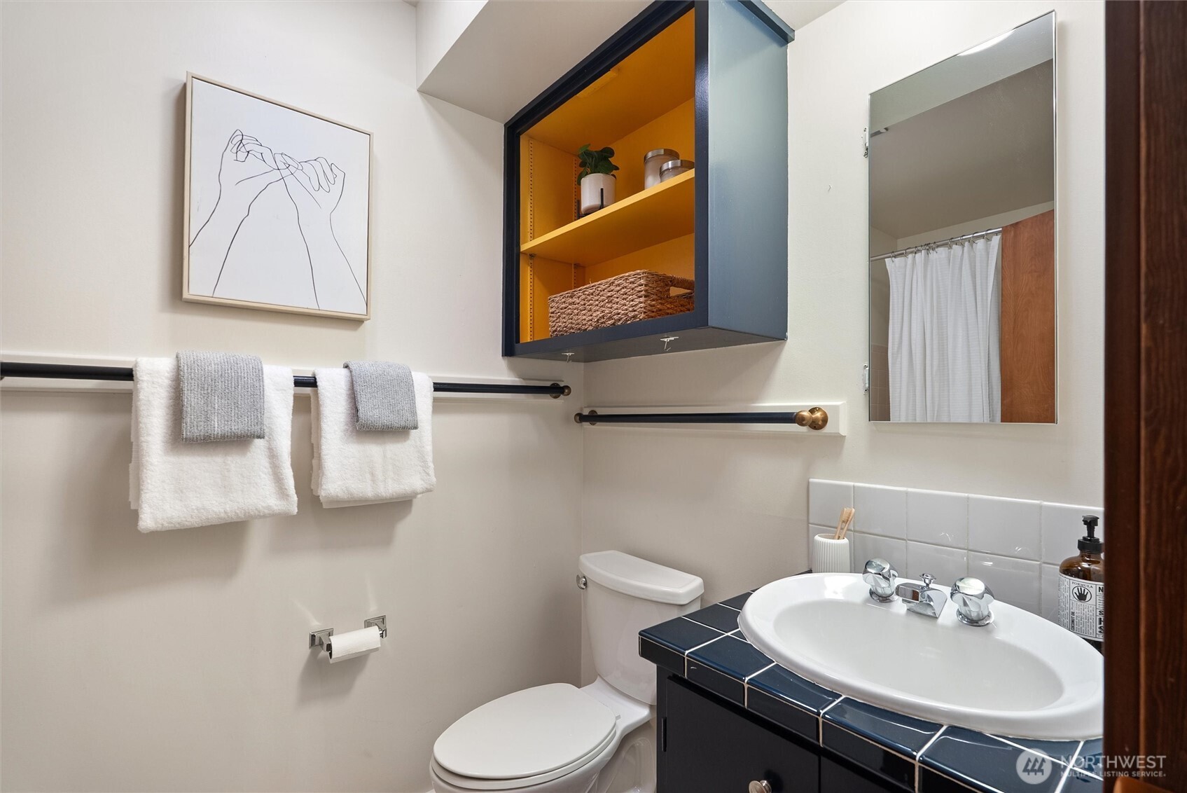 6920 160th Street Southwest Edmonds, WA 98026 - Photo 33 of 40 a bathroom with a sink mirror and toilet
