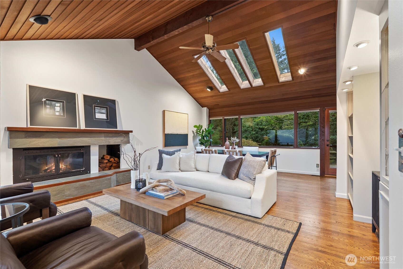 6920 160th Street Southwest Edmonds, WA 98026 - Photo 5 of 40 a living room with furniture and a fireplace
