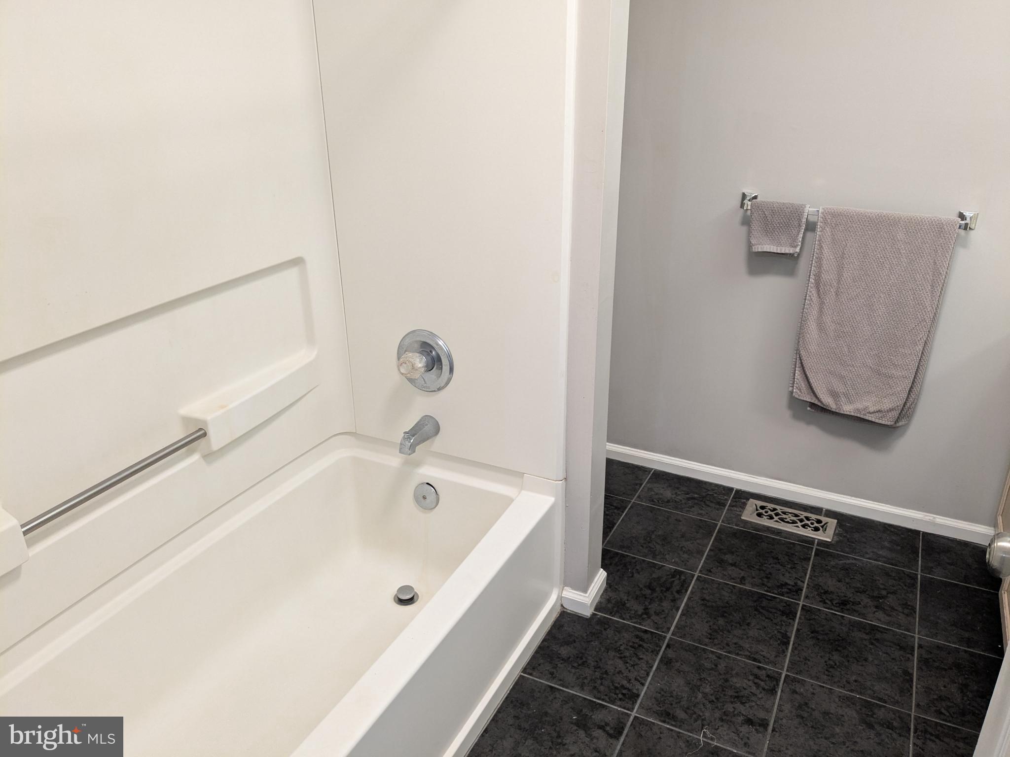 25 Millstream Road Pine Hill, NJ 08021 - Photo 23 of 28 a bathroom with a bathtub