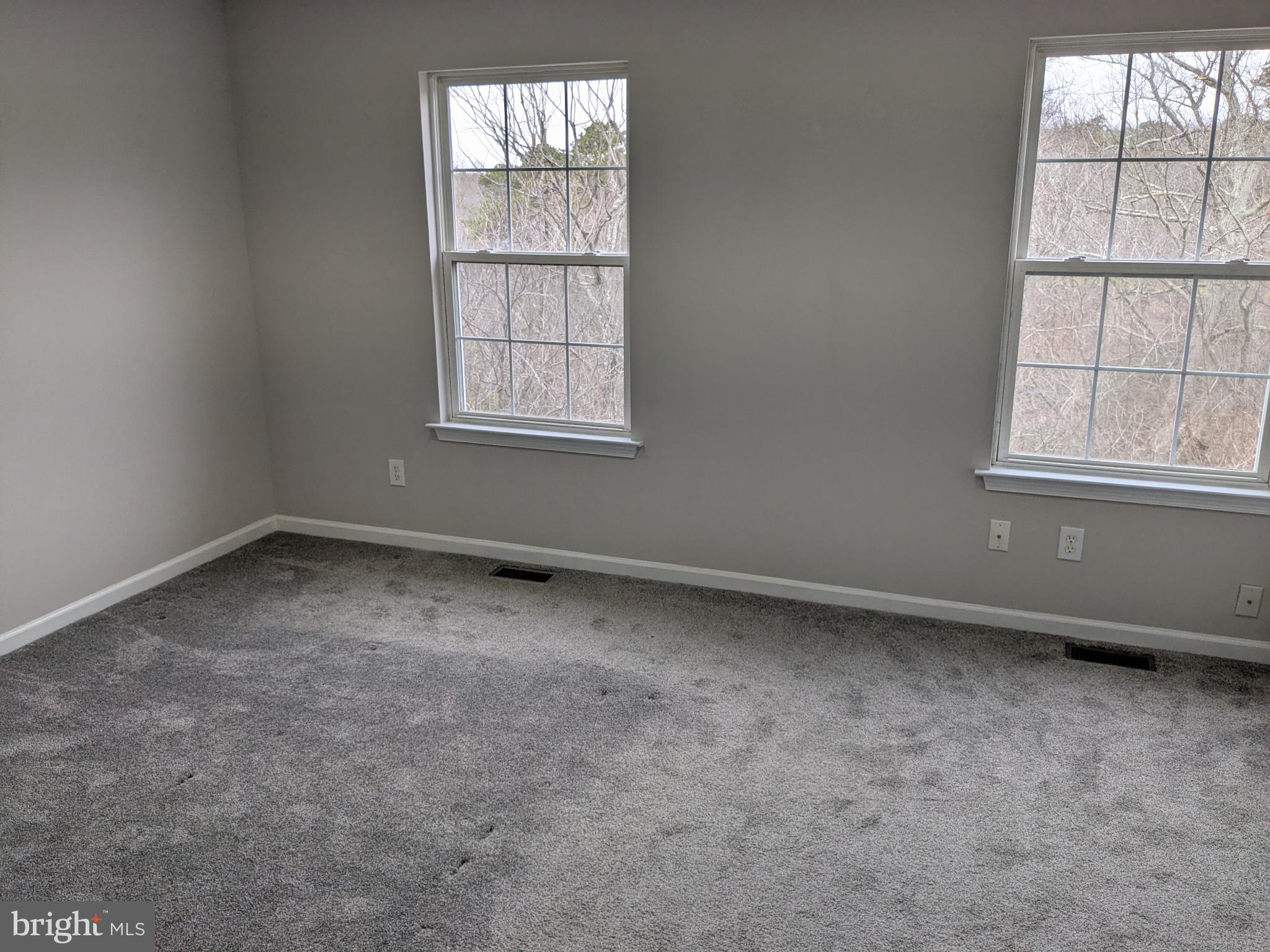25 Millstream Road Pine Hill, NJ 08021 - Photo 24 of 28 an empty room with a window