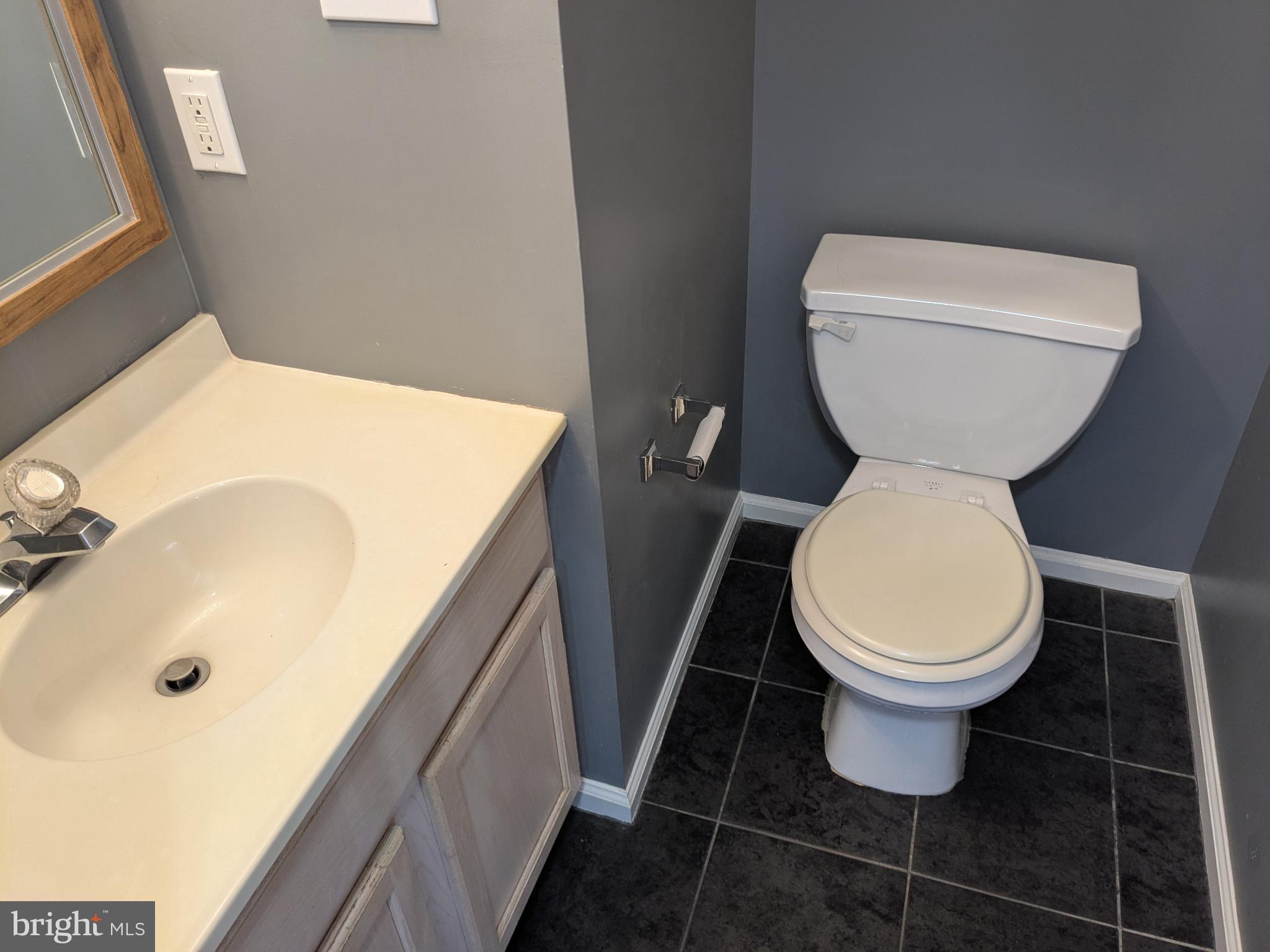25 Millstream Road Pine Hill, NJ 08021 - Photo 10 of 28 a bathroom with a toilet and a sink