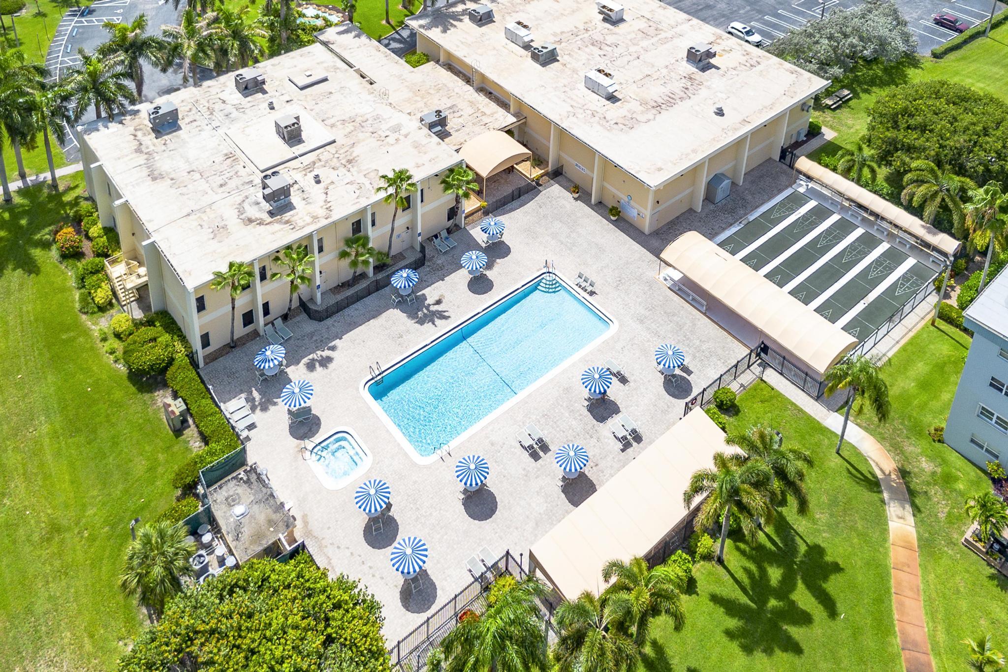 2600 Northeast 1st Lane, Unit 104 Boynton Beach, FL 33435 - Photo 36 of 41 a view of a house with a space and garden