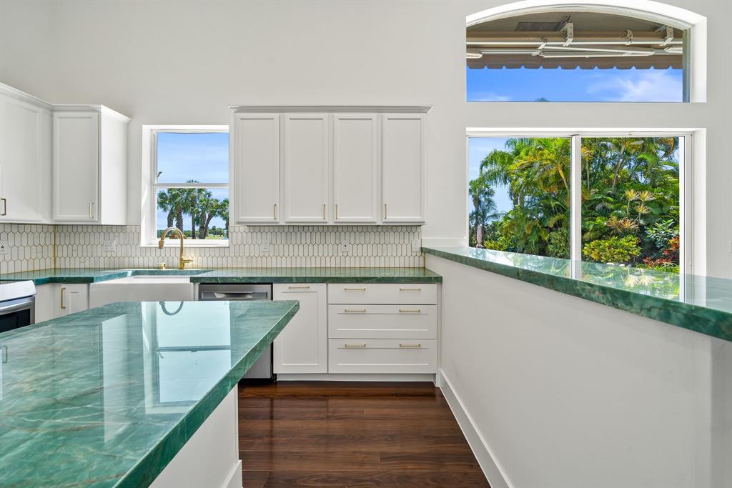 3950 Fieldview Way Wellington, FL 33414 - Photo 13 of 29 a kitchen with a window a sink and a stove