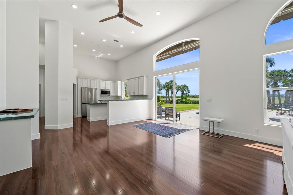 3950 Fieldview Way Wellington, FL 33414 - Photo 20 of 29 a view of a kitchen with furniture and wooden floor