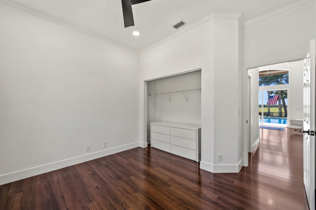 3950 Fieldview Way Wellington, FL 33414 - Photo 28 of 29 a view of empty room with wooden floor