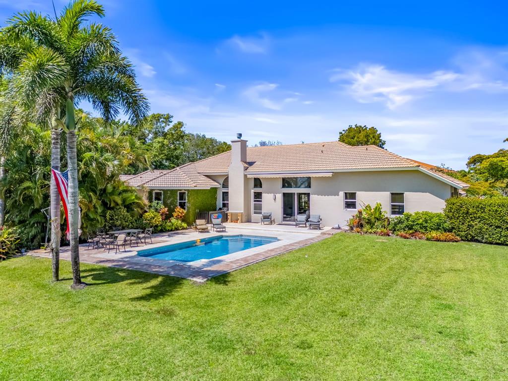 3950 Fieldview Way Wellington, FL 33414 - Photo 4 of 29 a view of house with outdoor space and entertaining space
