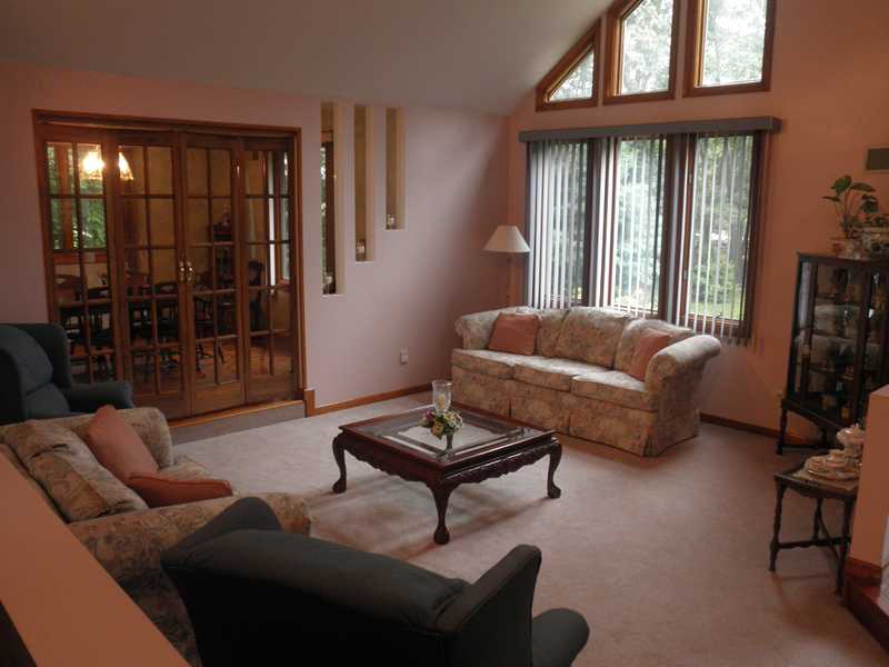183 Ridge Road Smithfield, RI 02917 - Photo 8 of 23 Living Room. Formal Living Room with Cathedral Ceilings - French Doors Lead to Formal Dining Room!