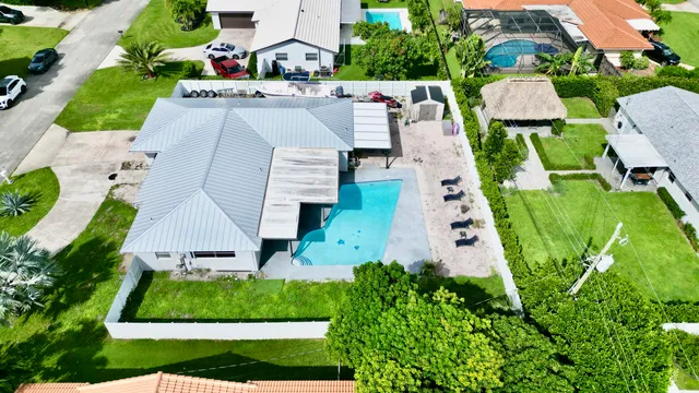 $825,000 | 1861 Caribbean Road West, Lake Clarke Shores, FL 33406