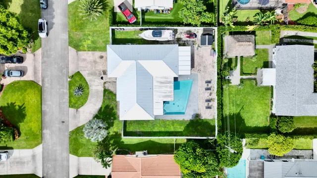 $825,000 | 1861 Caribbean Road West, Lake Clarke Shores, FL 33406