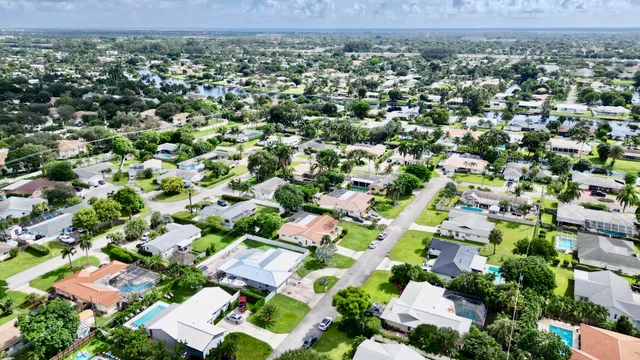 $825,000 | 1861 Caribbean Road West, Lake Clarke Shores, FL 33406