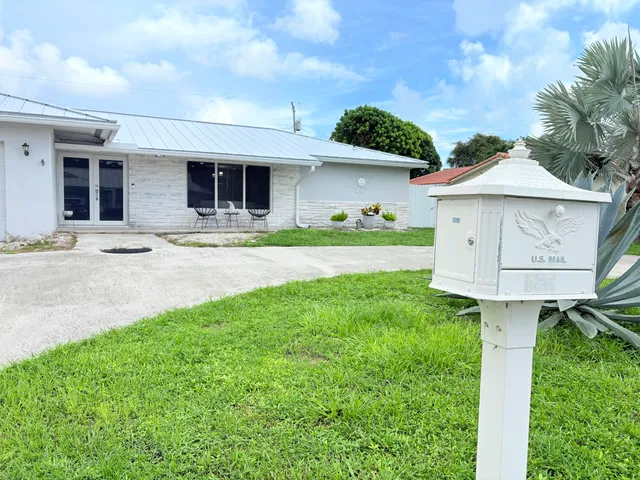 $825,000 | 1861 Caribbean Road West, Lake Clarke Shores, FL 33406